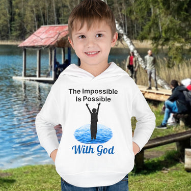 Rabbit Skins toddler fleece hoodie with “Impossible Toddler” design and faith-filled message, soft cotton-poly blend, durable stitching, Christian apparel for active toddlers and spiritual encouragement, toddler boy in white hoodie